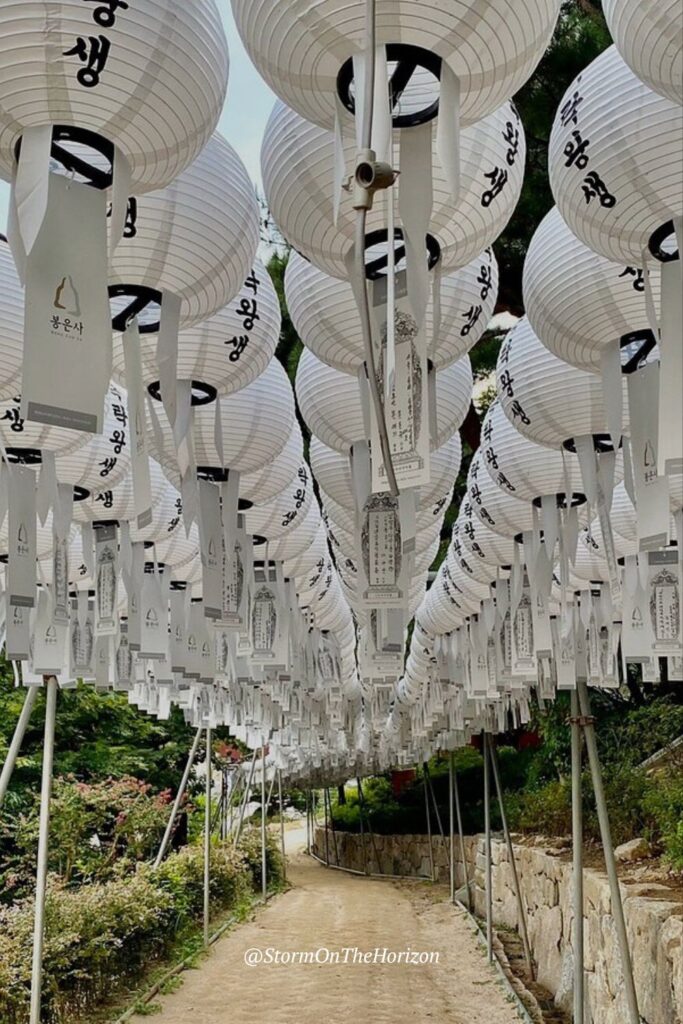 White lanterns hang from the sky at Bongeunsa Temple. Bongeunsa is a Buddhist temple that dates back to 794 just north of the COEX Mall in Gangnam-gu. Shared by Storm on the Horizon.