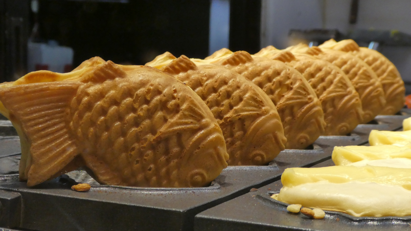 Upside down Bungeoppang (붕어빵) waiting to cool. These are fish-shaped pastries resembling carp, based off a Japanese snack. Shared by Storm on the Horizon in a guide to vegetarian street food in South Korea